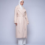 belted long coat by Kharzaat with adjustable waist belt