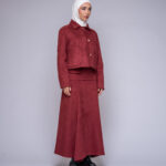 suede jacket skirt set by Kharzaat with gold button design