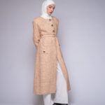 tweed coat by Kharzaat with adjustable belt and gold buttons