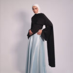 Contrast Flow Dress by Kharzaat featuring an adjustable scarf, lightweight black bodice, and flowing matte satin skirt