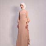 Waterfall Sleeve Dress in Ivory by Kharzaat featuring dramatic cascading waterfall sleeves and a fitted maxi silhouette